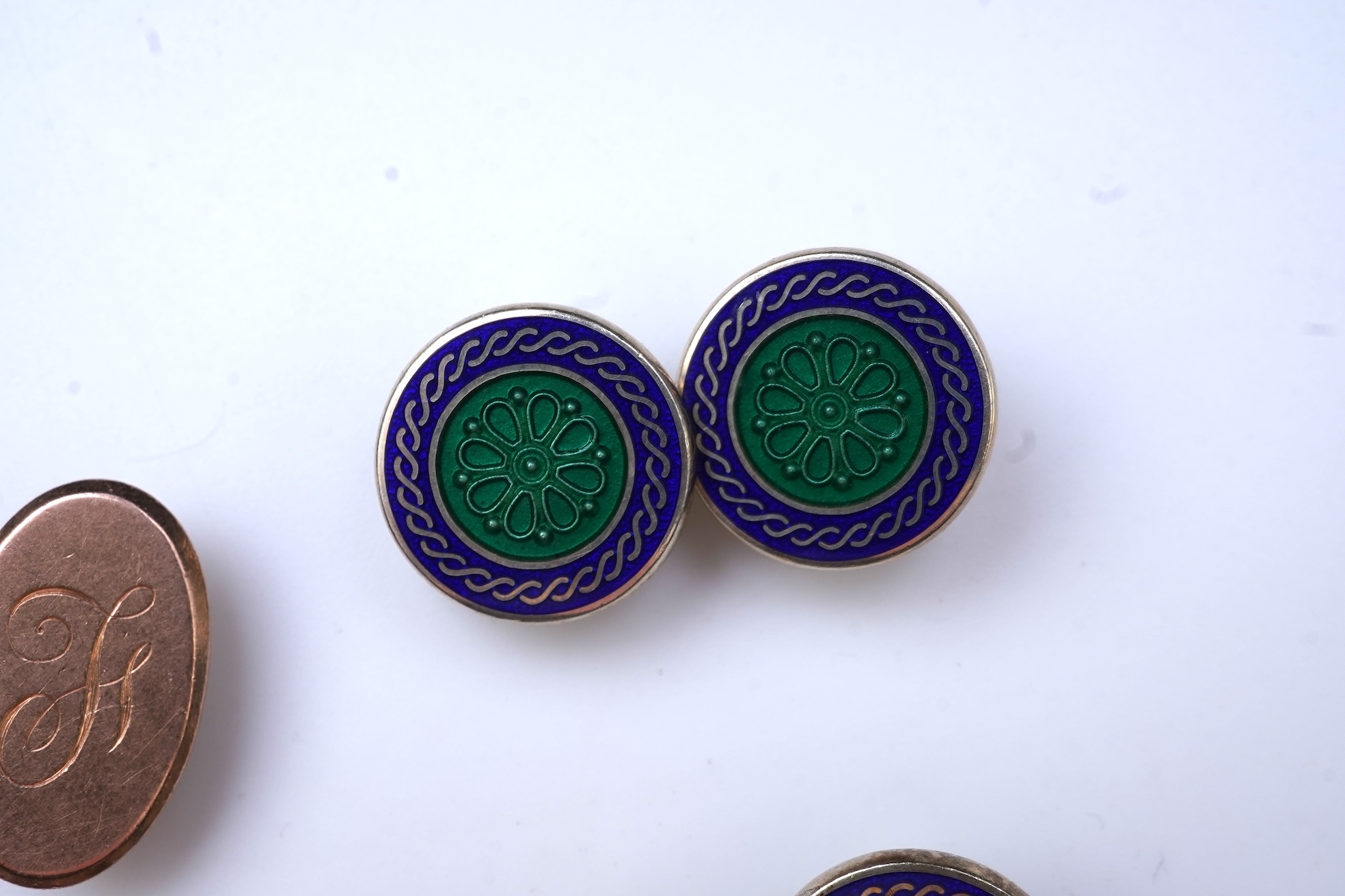 A collection of cufflinks and dress studs